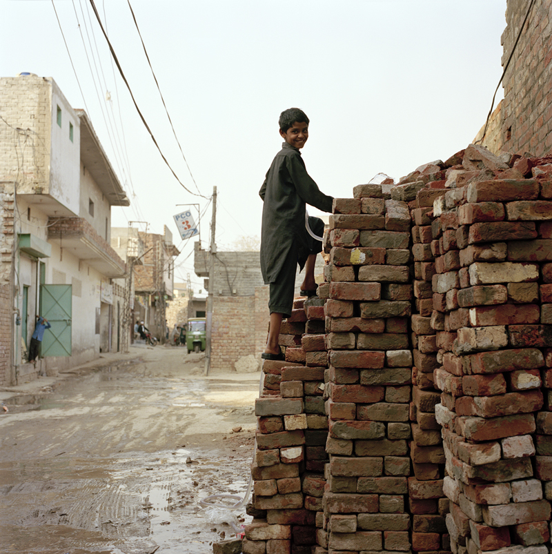 Artist: Ayesha Malik | "Kid on bricks."
