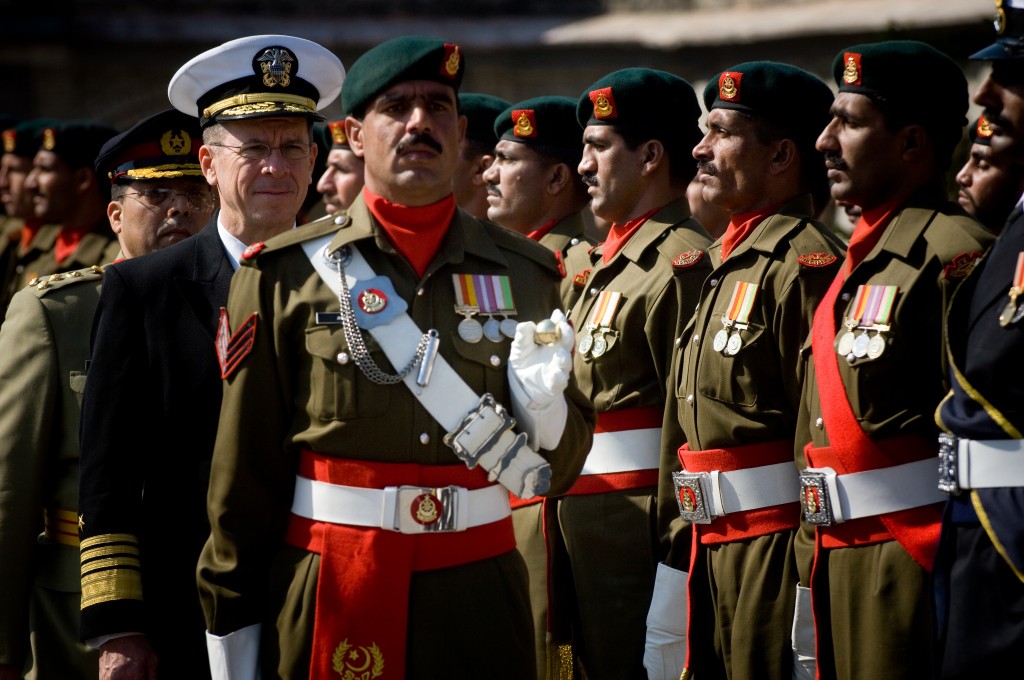 Adm. Mike Mullen, U.S. chairman of the Joint Chiefs of Staff reviews Pakistani troops at an honors ceremony welcoming Mullen to Islamabad, Feb. 9, 2008. - Read: Abuses on the Path to Salvation | Adaner Usmani